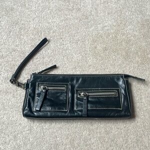 Nordstrom black leather clutch wristlet with creamy white stitching: